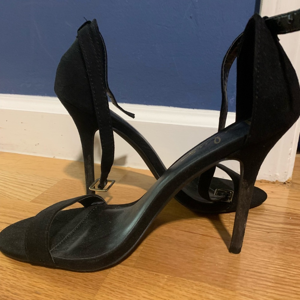 Black single-strap stiletto heels